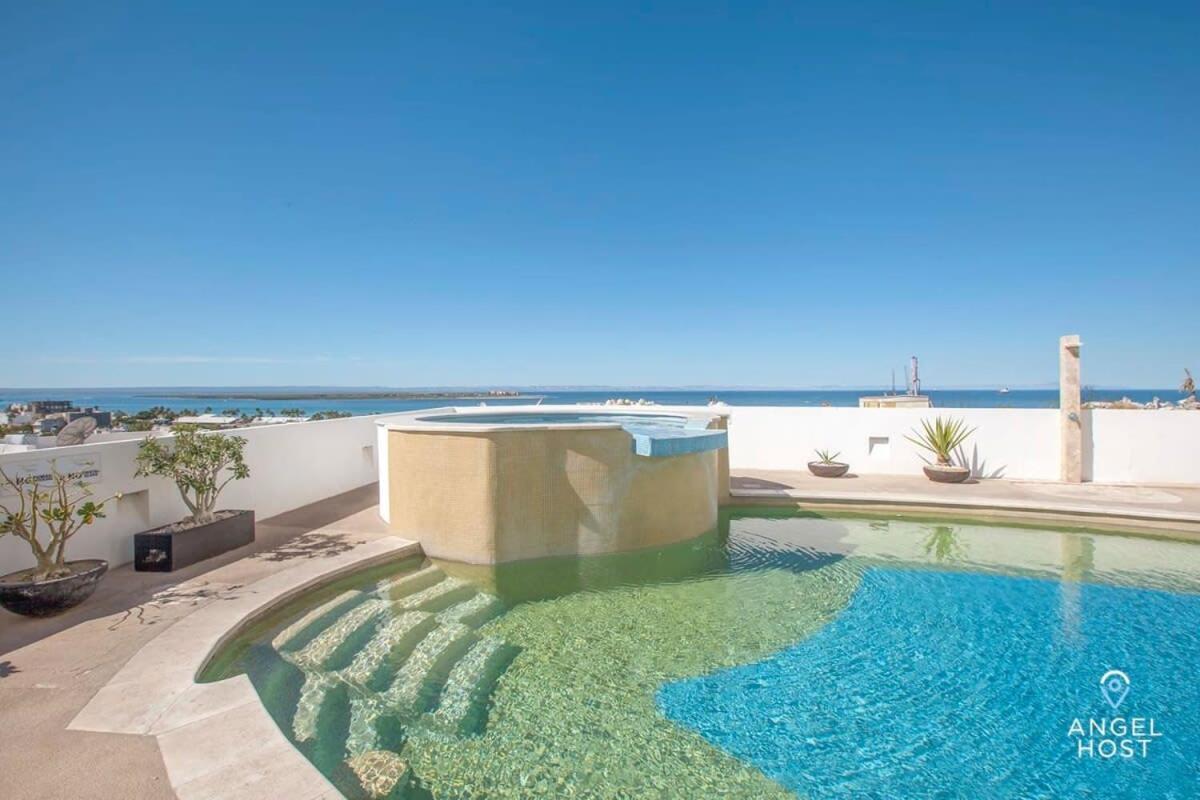 With Spectacular Ocean View & Pool Onsite La Paz